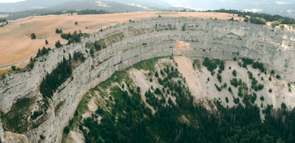 Panoramic view of Creux du Van showcasing the spirit of Switzerland for nature lovers.