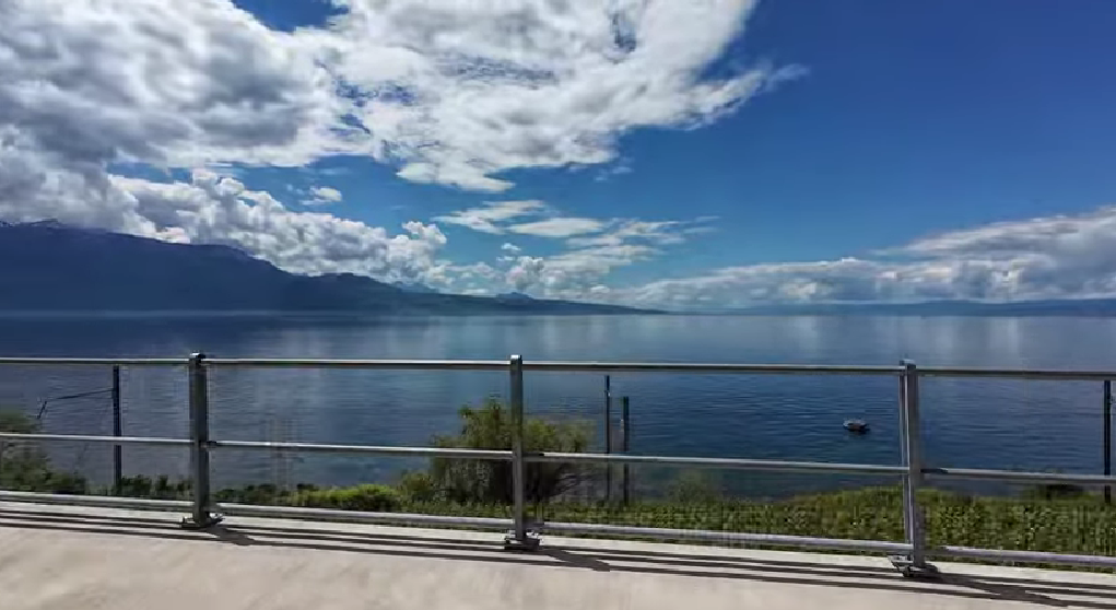 Cycling along the peaceful Lake Geneva bike path