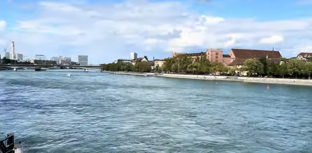 Scenic view of the Rhine River flowing through Basel, a cultural hub and one of the Oldest Cities in Switzerland.