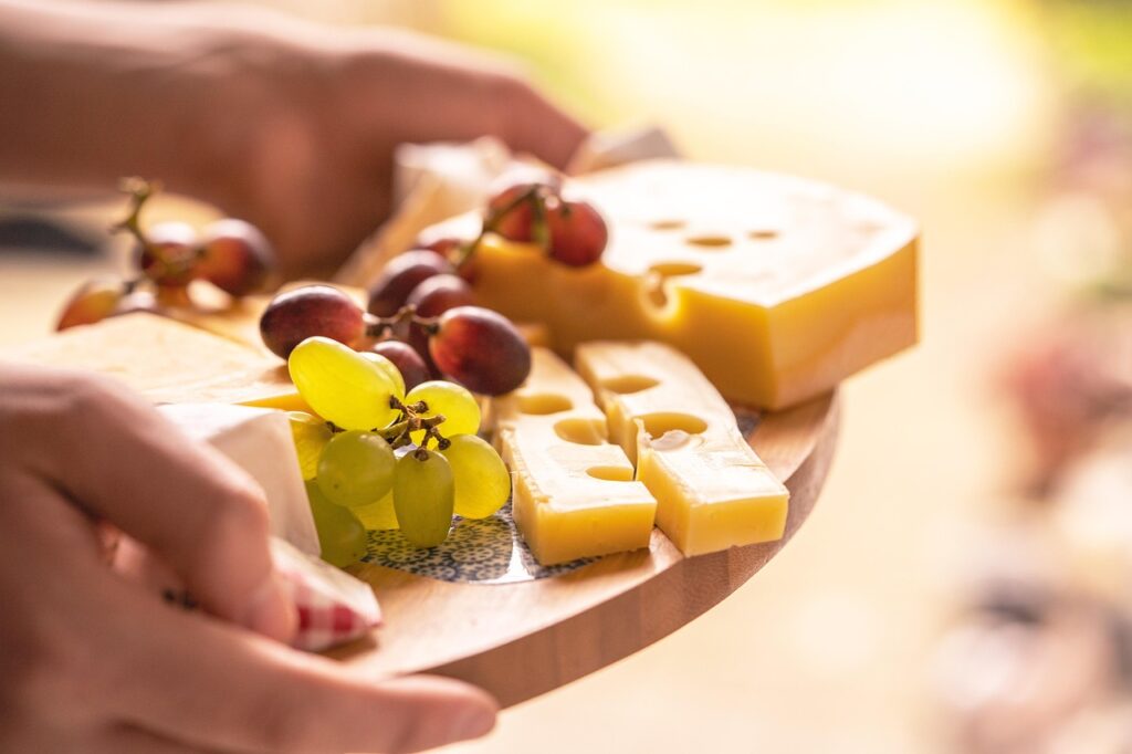 Swiss cheese platter with grapes