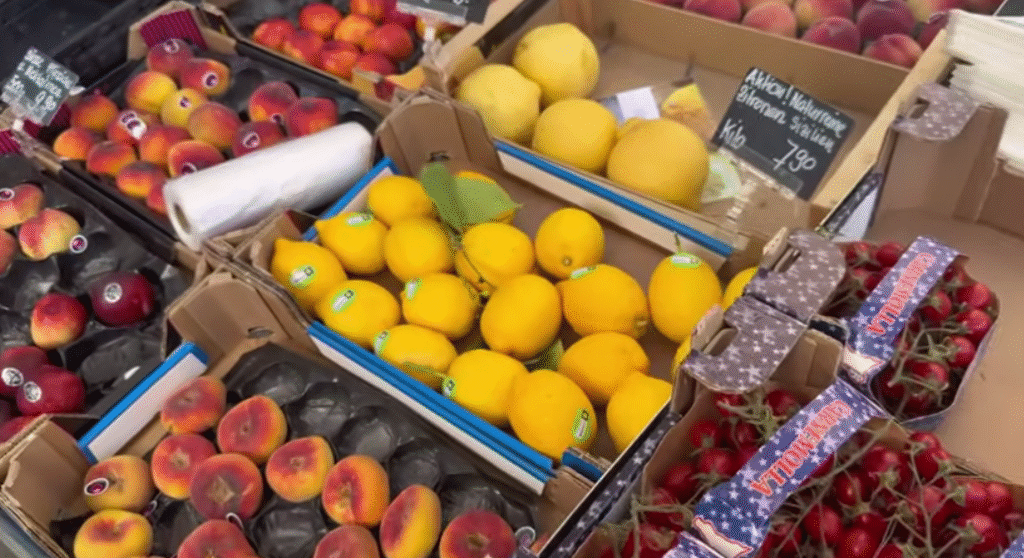 Colorful fresh fruits displayed on a market stall at the farmers’ market in Lucerne, Switzerland