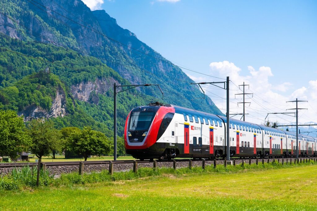 SBB train traveling through scenic Swiss landscape