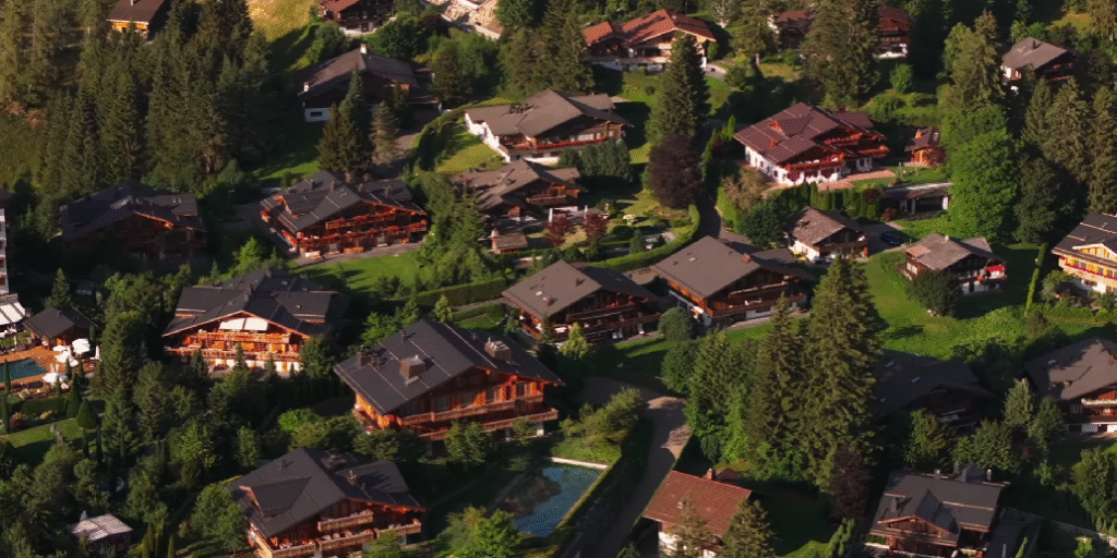 Aerial view of Gstaad, Switzerland, showing the picturesque alpine village.