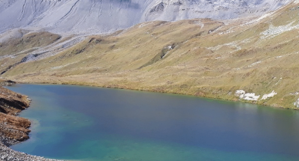 Lai da Ravais-ch, a secluded alpine lake in Engadin – one of the most beautiful hidden lakes in Switzerland