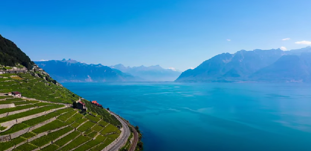 Motorcycle route along the Lavaux Vineyards, one of the most scenic motorcycle routes in Switzerland, with terraced vineyards, Lake Geneva views.