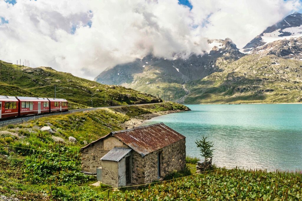 Swiss train winding through alpine mountains